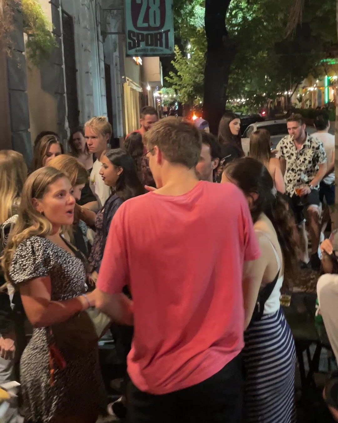 A crowd outside a bar in Palermo at one of our past nights